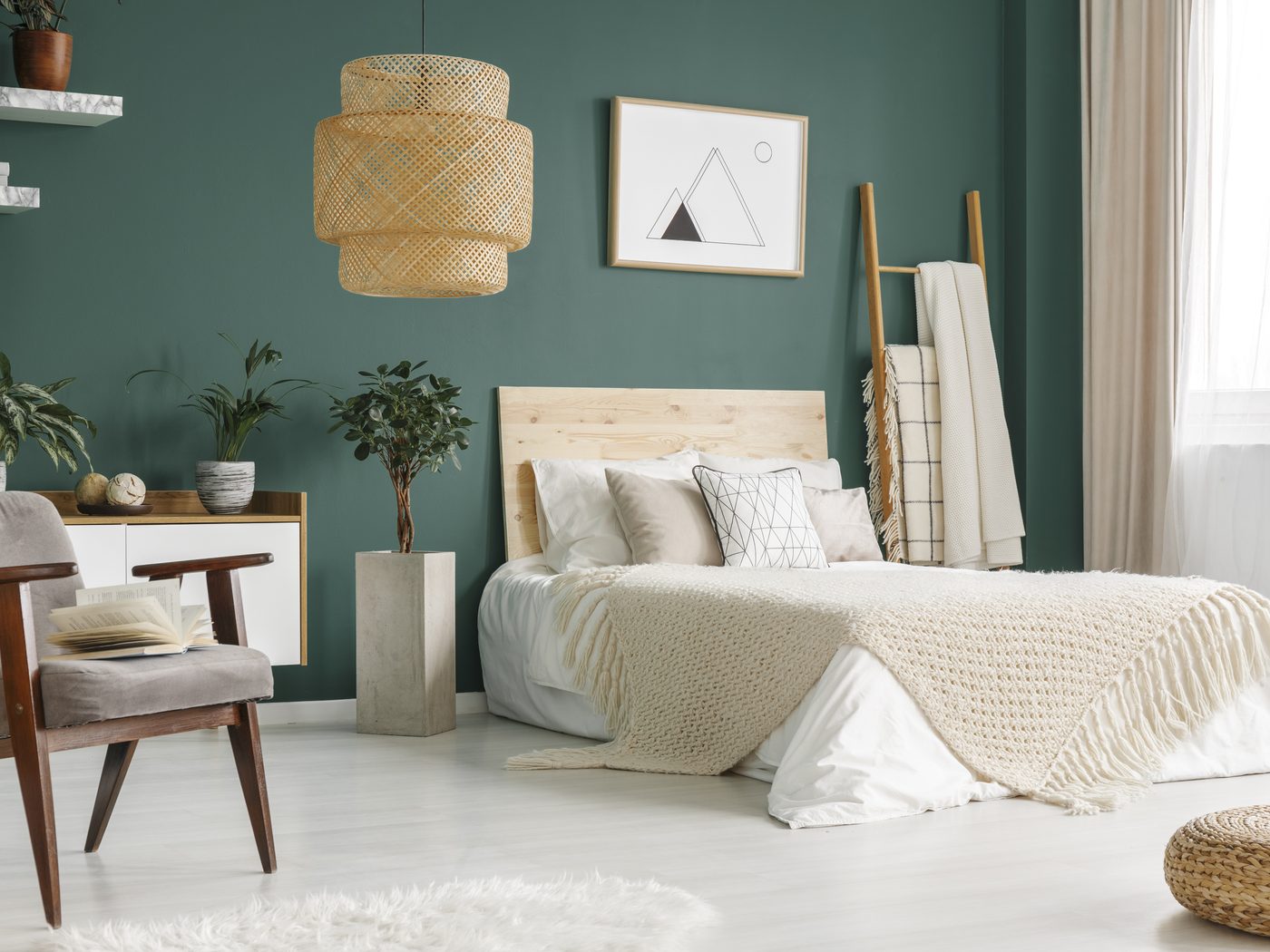 The same bedroom finished in green and linen