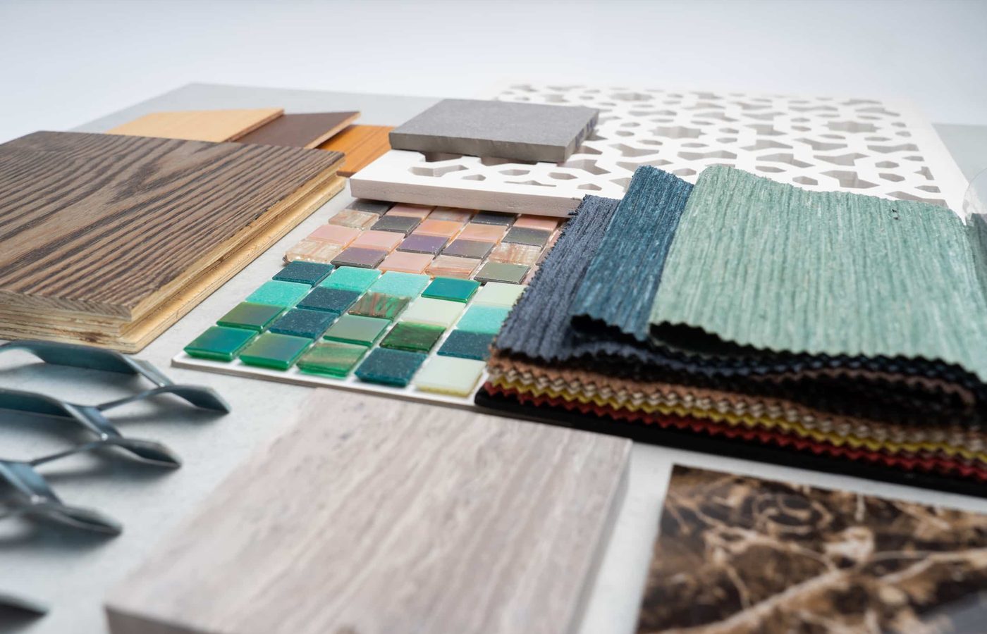 Tile, timber and fabric samples on the studio table