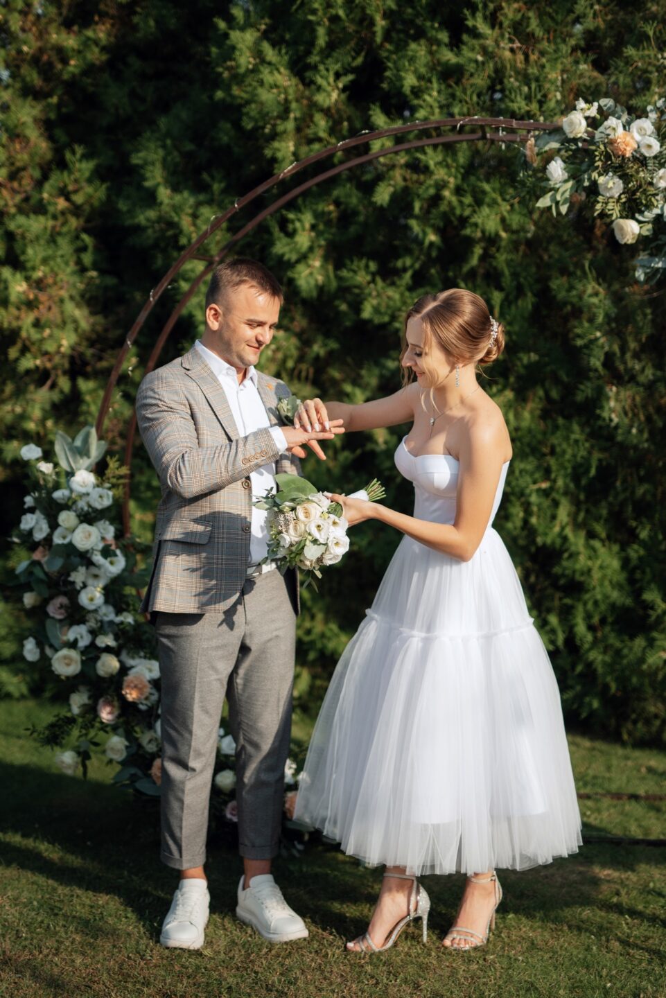 Newlyweds on a sunlit glade