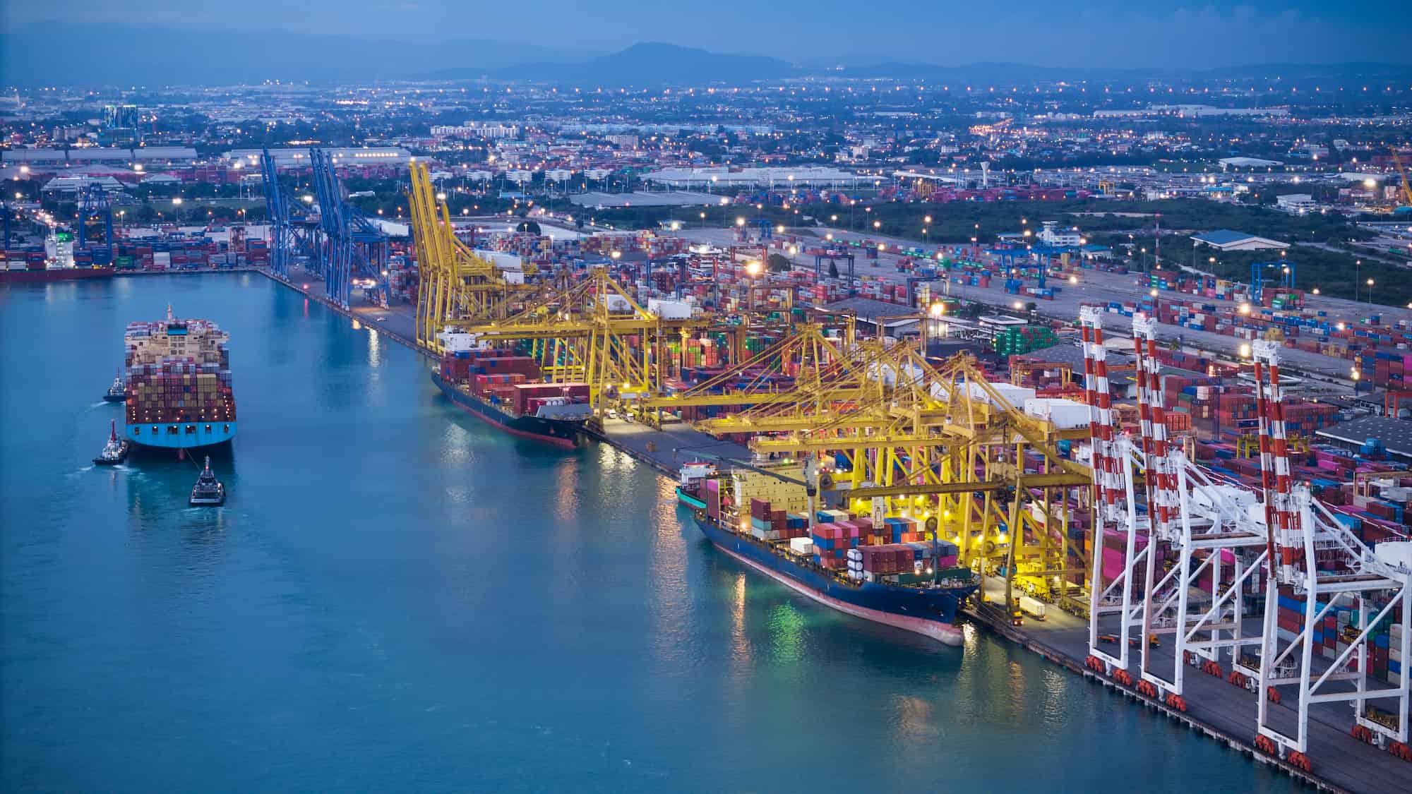 Singapore port at dusk with container terminals